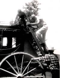 Climbing aboard stagecoach